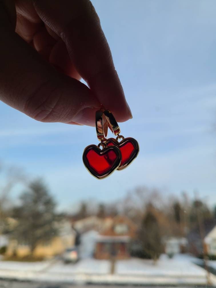 Gold plated translucent red heart huggie hoops